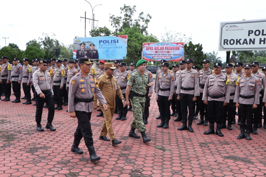 Gelar Pasukan Pengamanan Pilpeng Serentak 2026, Kapolres Rohil Tekankan Netralitas dan Demokrasi